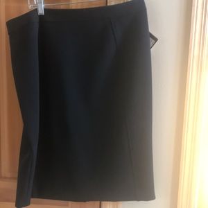 Halogen black knee length midi skirt size 12. NWT